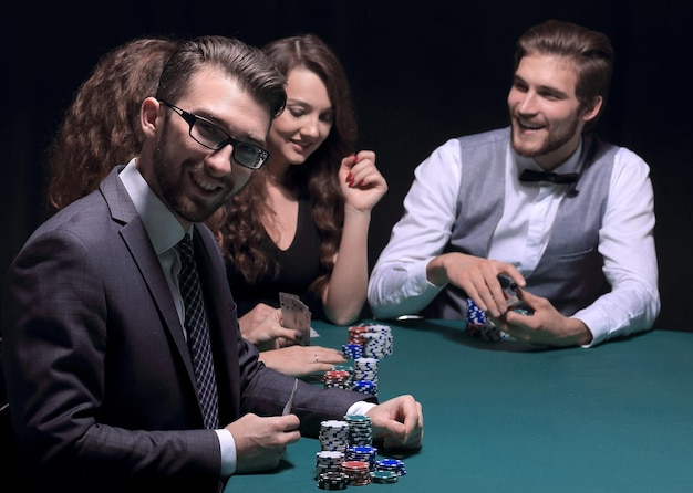 Modern businessman playing poker