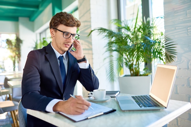 Modern Businessman Speaking by Phone