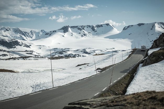 Modern Camper Van on a Norwegian Mountain Road