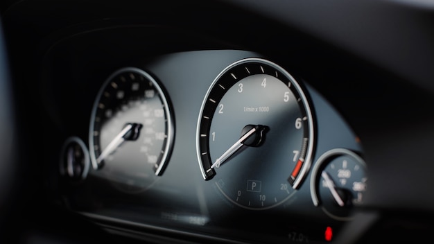 Modern car miles speedometer close up