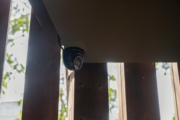 Modern CCTV security camera on ceiling