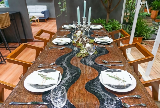 Modern ceramic tableware in dining room with table set ready for a nice meal