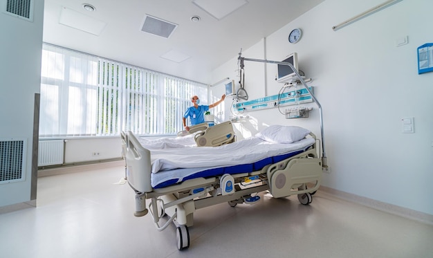 Modern chamber in present clinic Medical bed and a special device in the modern ward Special modern chamber in hospital