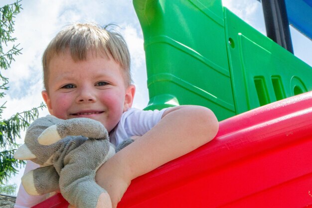 Modern children playground in park. Made in different colors. High quality photo