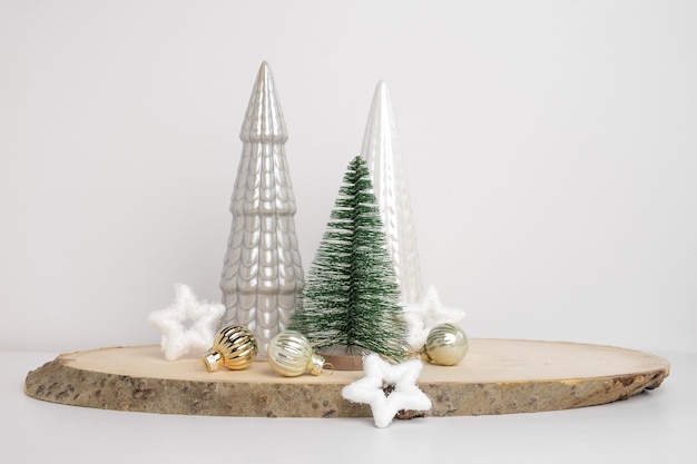 Modern Christmas trees Decorative Beige White and Green Christmas Decoration on a Wooden Stand with a Gray background Nordic Festive Decor Boho Scandinavian Style Design Trendy Minimal Ornament