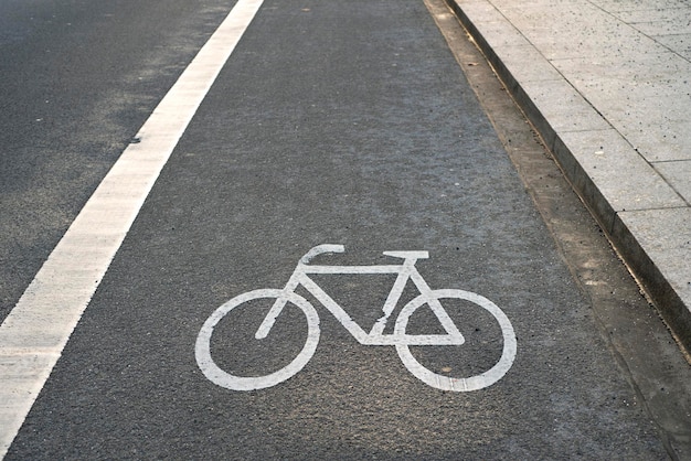 Modern city pavement with bicycle sign on it