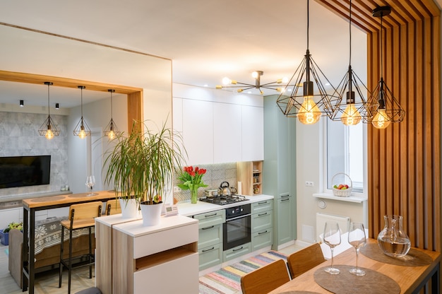 Modern classic white kitchen interior with dining zone