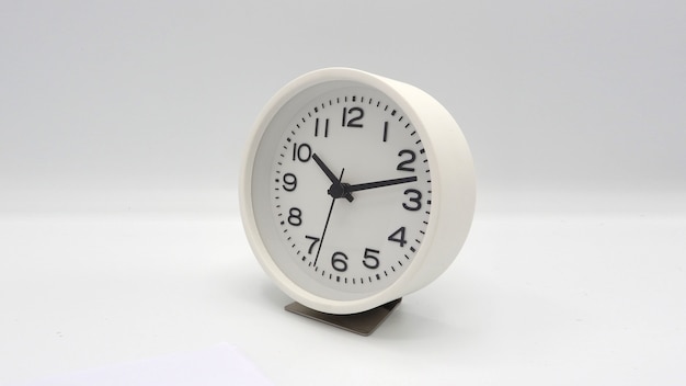 Modern and clean white color clock with minute hand and hour hand