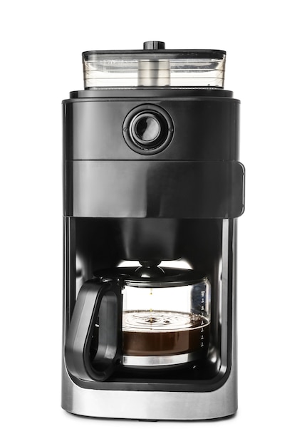 Modern coffee machine on white surface