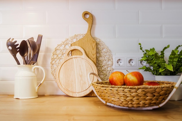 Modern composition in the interior of the kitchen with cutting boards fruits