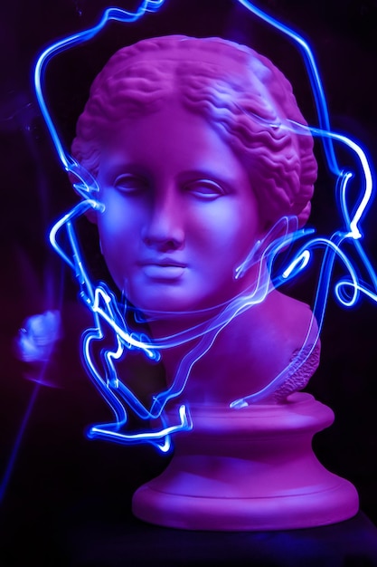 Photo modern conceptual art colorful poster with ancient statue of bust of venus. contemporary art photo. long exposure. light brush.