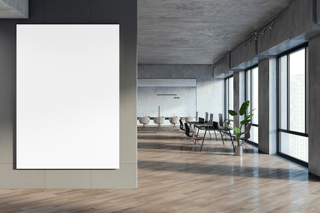 現代コワーキングオフィスのインテリアは空白のモックアップポスター家具窓設備ワークプレイスコンセプト 3Dレンダリング