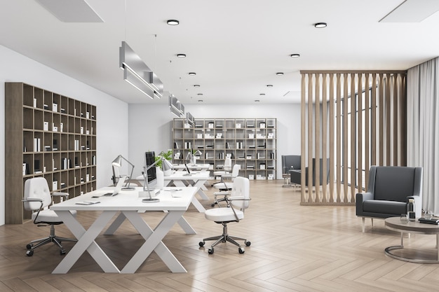 Modern coworking office in a loft style interior with computers
chairs and shelves with folders workplace and