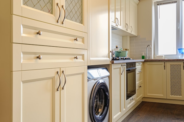 Photo modern cream colored kitchen interior