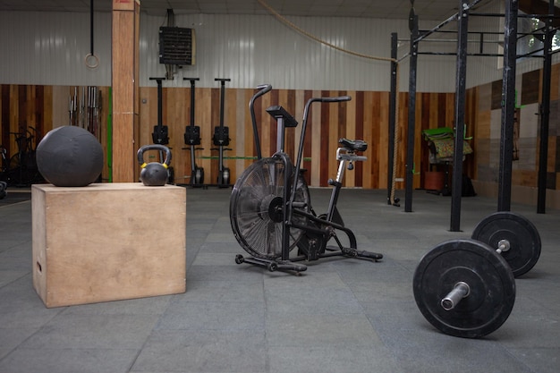 Photo modern cross fit club with equipment for functional training