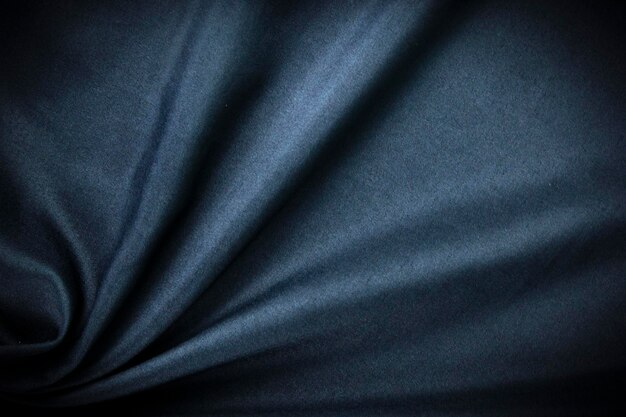 Modern dark navy blue fabric texture background and crumpled fabric background picture used in clothes and fashion concept banners