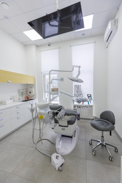 Modern Dental office equipment at dental office Dental chair and other accessories