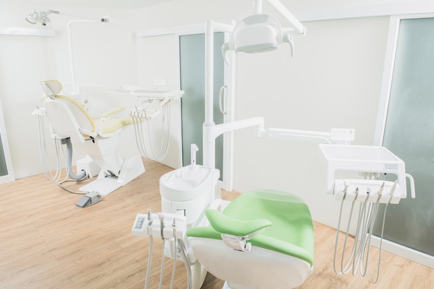 Modern dental practice. Dental chair and other accessories used by dentists