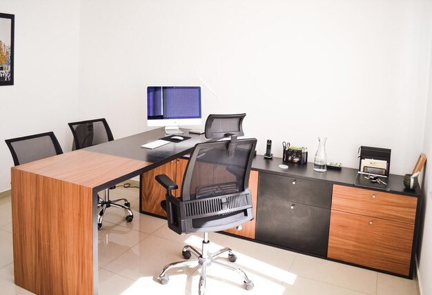 Modern designer desk for office business and creative spaces Wooden desk in black color with storage drawers