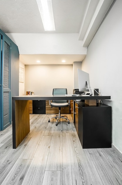 Modern designer desk for office business and creative spaces Wooden desk in black color with storage drawers