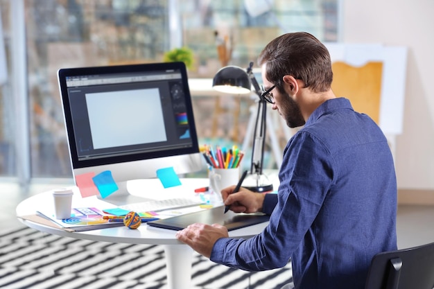 modern designer working with graphic tablet