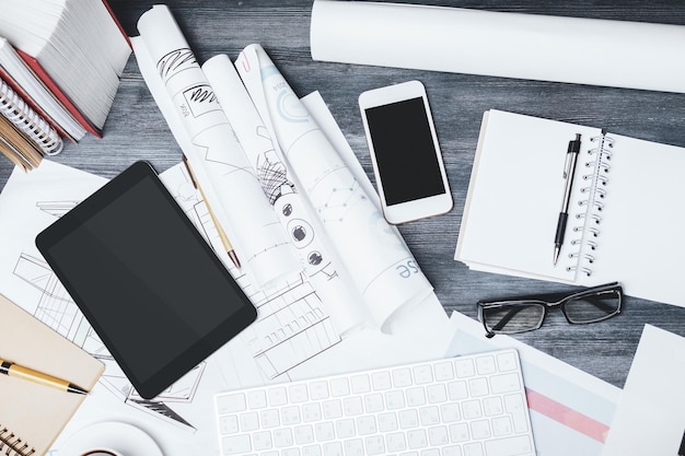 Modern desk with blank touchpad and smartphone