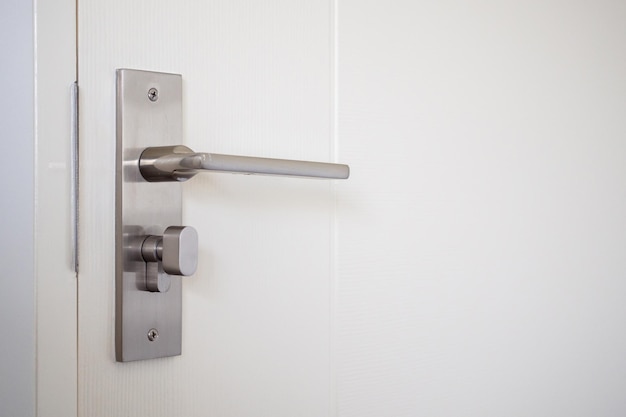 Modern door handle with on white door