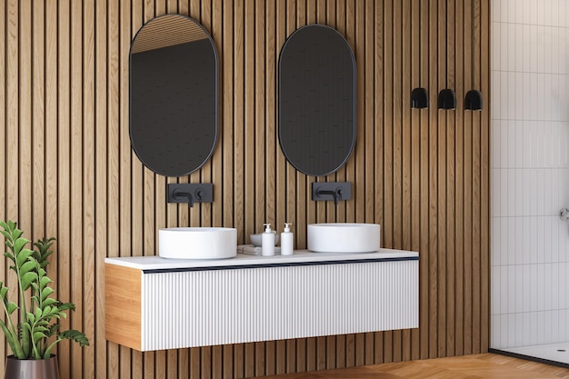 Modern double  sink standing in modern bathroom with white and wooden walls and wooden floor.