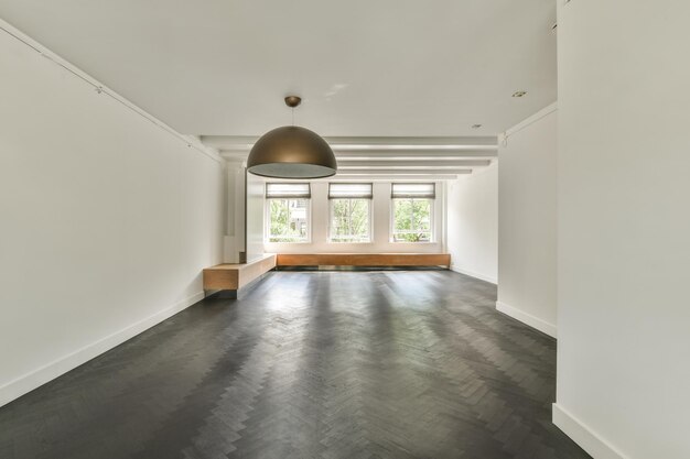 Modern empty living room with open kitchen and staircase