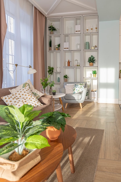 Modern expensive luxurious open-plan apartment. Rich Scandinavian-style interior with wooden beams on the ceiling in pastel colors