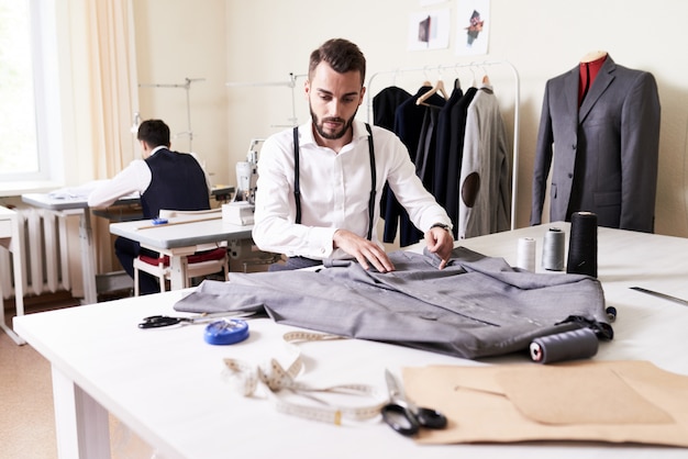 Modern Fashion Designer Working in Atelier