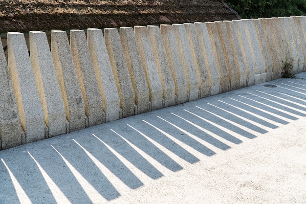 Modern fence made of granite stone.