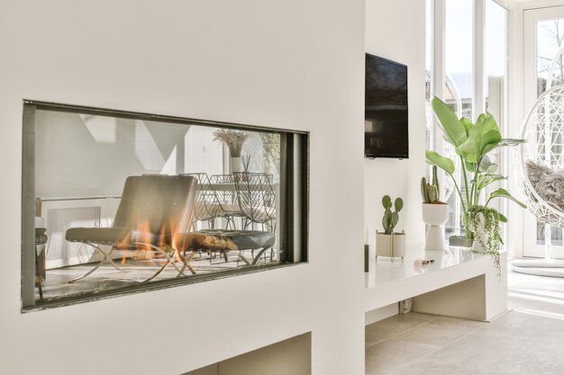 Modern fireplace in white wall