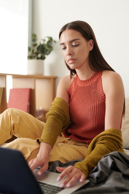 Modern girl composing email