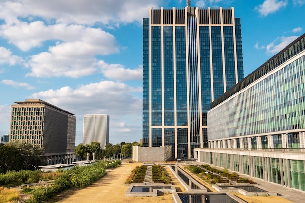 Modern glass buildings and botanical garden in Brussels