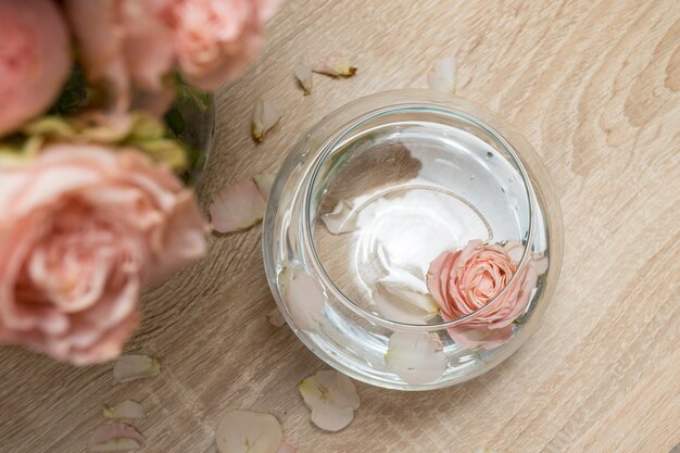 Modern glass vase with roses Scandinavian interior