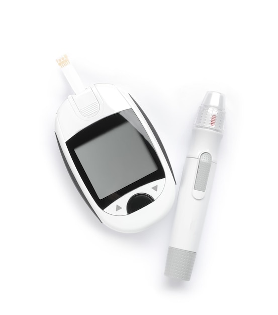 Modern glucometer with test strip and lancet pen on white background top view