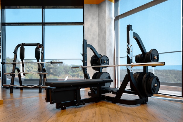 Modern gym interior with new fitness equipment