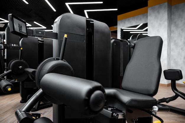 Modern gym interior with new fitness equipment