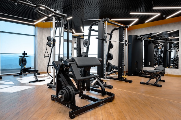 Modern gym interior with new fitness equipment