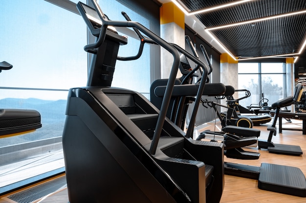 Modern gym interior with new fitness equipment