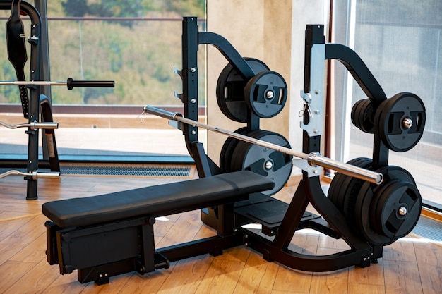 Modern gym interior with new fitness equipment