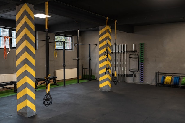 Modern gym room Fitness Center with equipment and machines