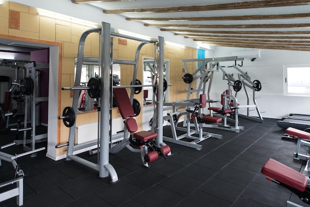 Modern Gym Room Fitness Center With Equipment And Machines