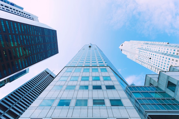 Modern high building in business city center with blue sky.