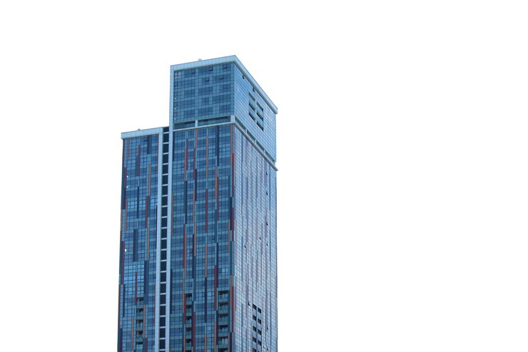 Modern highrise glass building isolated on white background