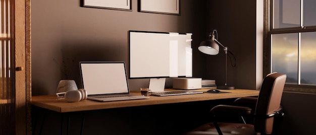 Modern home office with laptop and computer mockup on table with stuff against the black wall