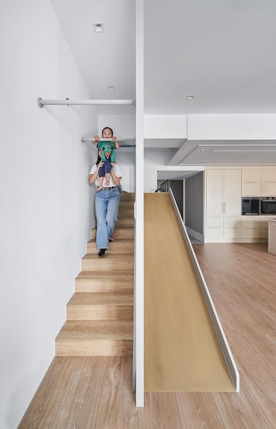 Modern Home with Playful Stair Slide