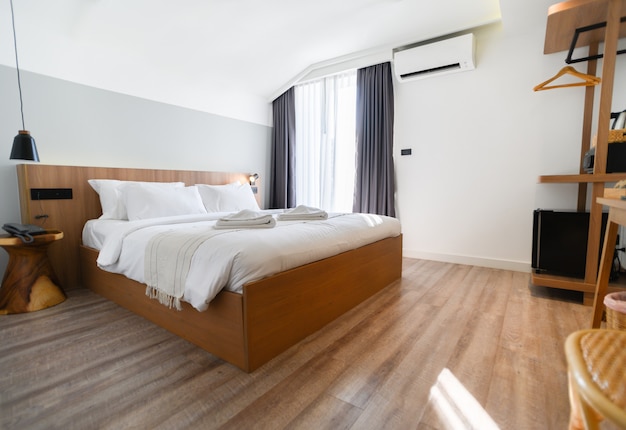 Modern hotel room with large bed