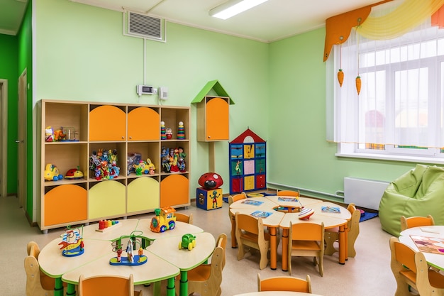 modern interior of playroom in kindergarten.